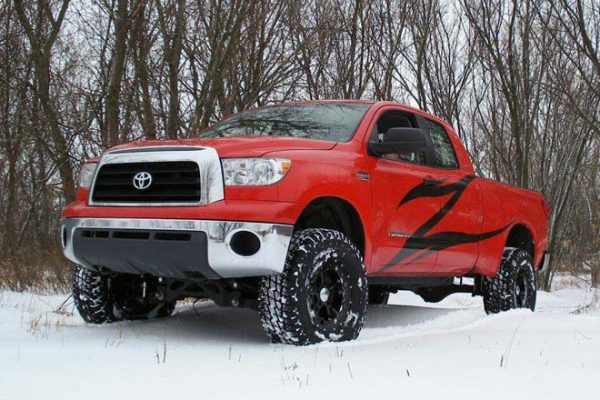 T1 - Zone Offroad 5" Lift Kit Suspension System for 2007-2015 Toyota Tundra - installed - red Tundra - on the snow - front