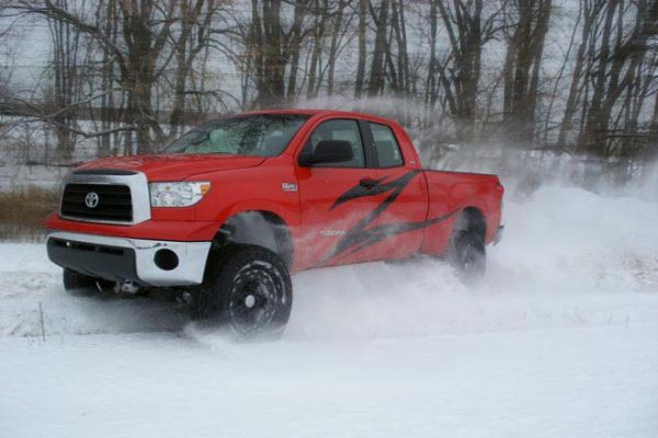 T1 - Zone Offroad 5" Lift Kit Suspension System for 2007-2015 Toyota Tundra - installed - red tundra - driving on the snow