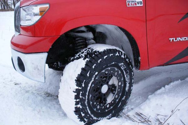 T1 - Zone Offroad 5" Lift Kit Suspension System for 2007-2015 Toyota Tundra - installed - red tundra - front tire view