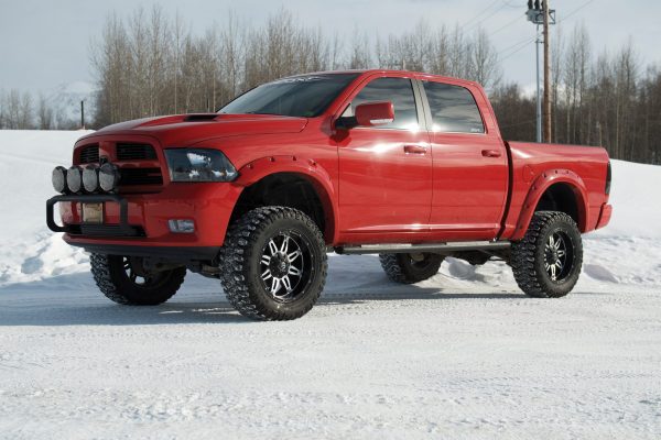 Zone OffRoad 6" Lift Kit installed on a red 2009-2011 Dodge Ram 1500 4WD