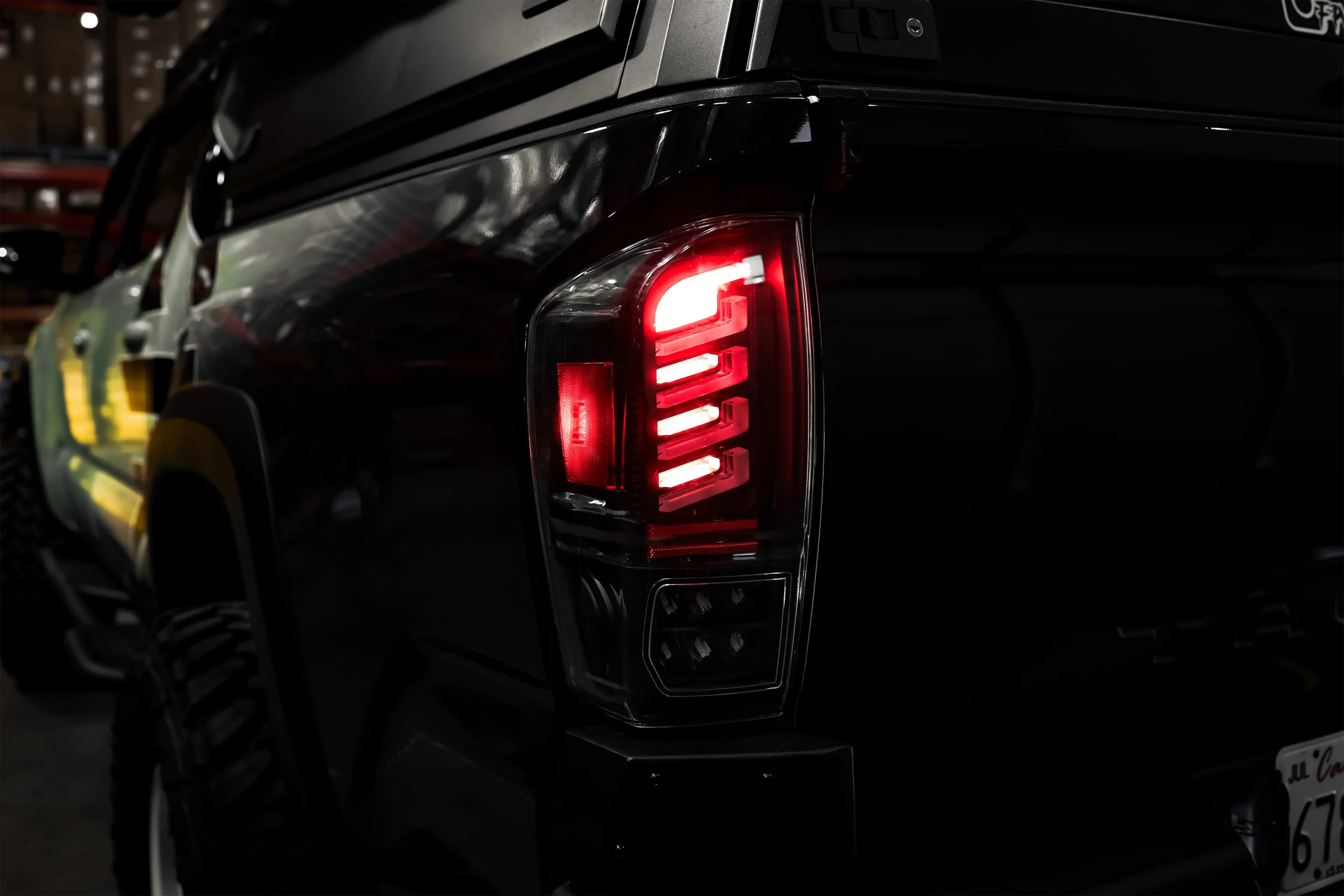 CTATT-0765-GBC-SQ_Attica_4x4_2016-2023_Toyota_Tacoma_Rogue_Series_Tail_Lights_Lifestyle_03