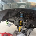 Bilstein 4600 Assembled Coilovers with OE Replacement Springs with Rear Shocks and Coils for 1996-2002 Toyota 4Runner installed - front coilover view