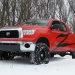 T1 - Zone Offroad 5" Lift Kit Suspension System for 2007-2015 Toyota Tundra - installed - red Tundra - on the snow - front