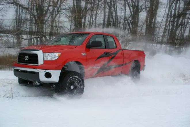 T1 - Zone Offroad 5" Lift Kit Suspension System for 2007-2015 Toyota Tundra - installed - red tundra - driving on the snow