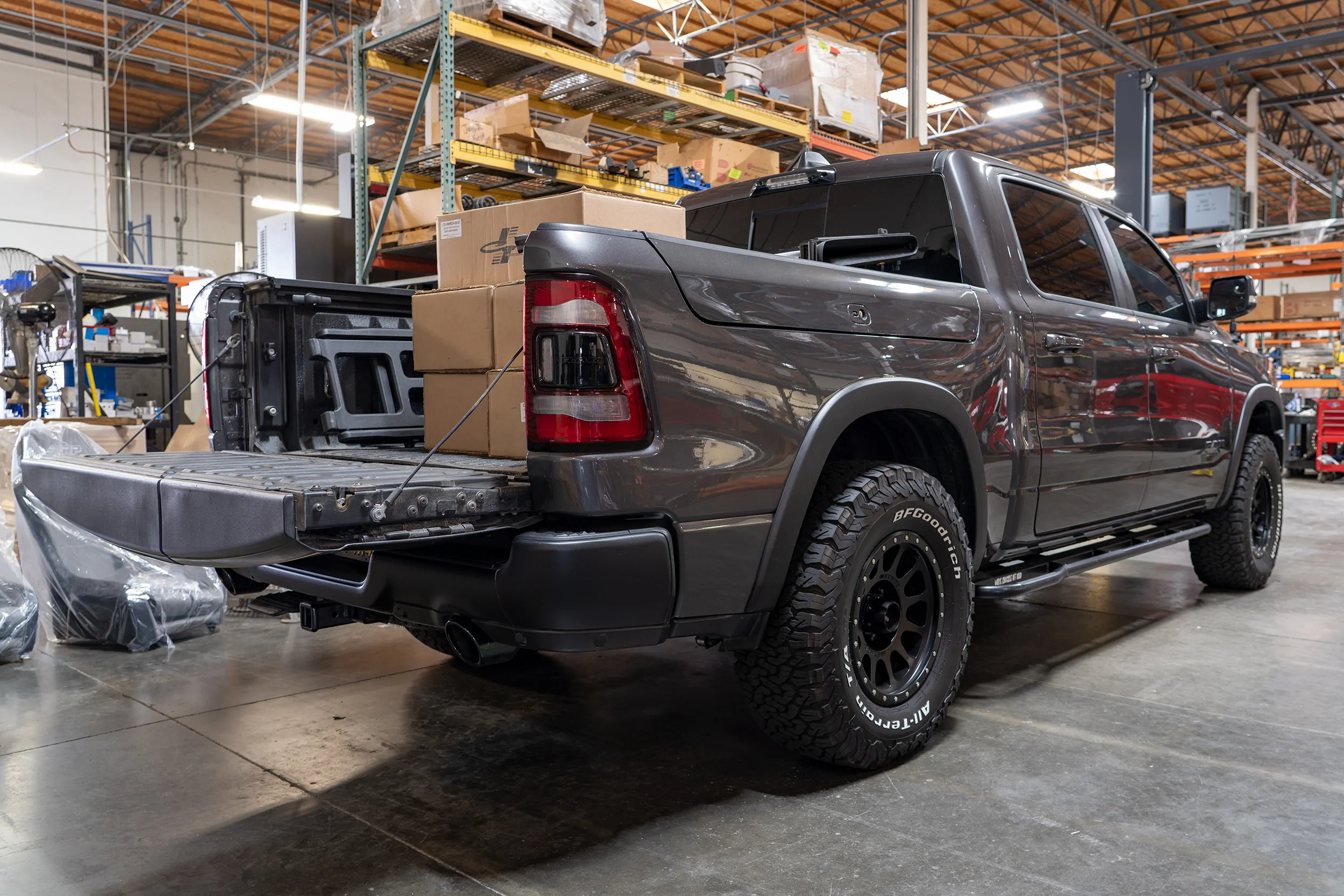 Carli 1 inch Rear Lift 500LB Rated Coil Springs for 2019-2023 Ram 1500 Rebel back view loaded with 500lb