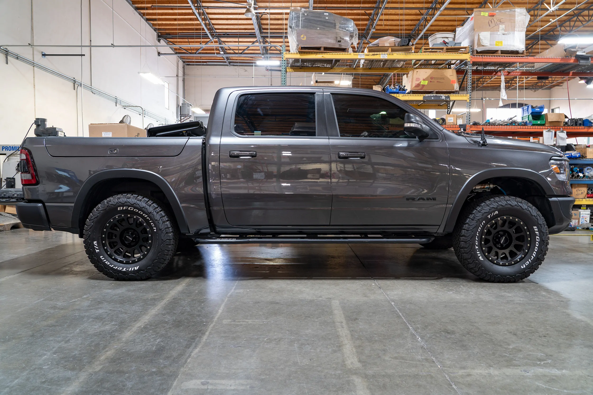 Carli 1 inch Rear Lift 500LB Rated Coil Springs for 2019-2023 Ram 1500 Rebel side view loaded with 500lb